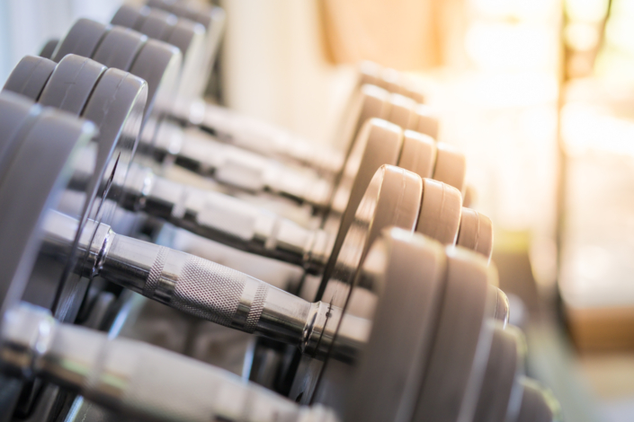 Rows,Of,Metal,Dumbbells,On,Rack,In,The,Gym,/